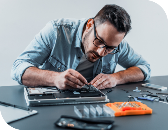 Technician working on electronics repair